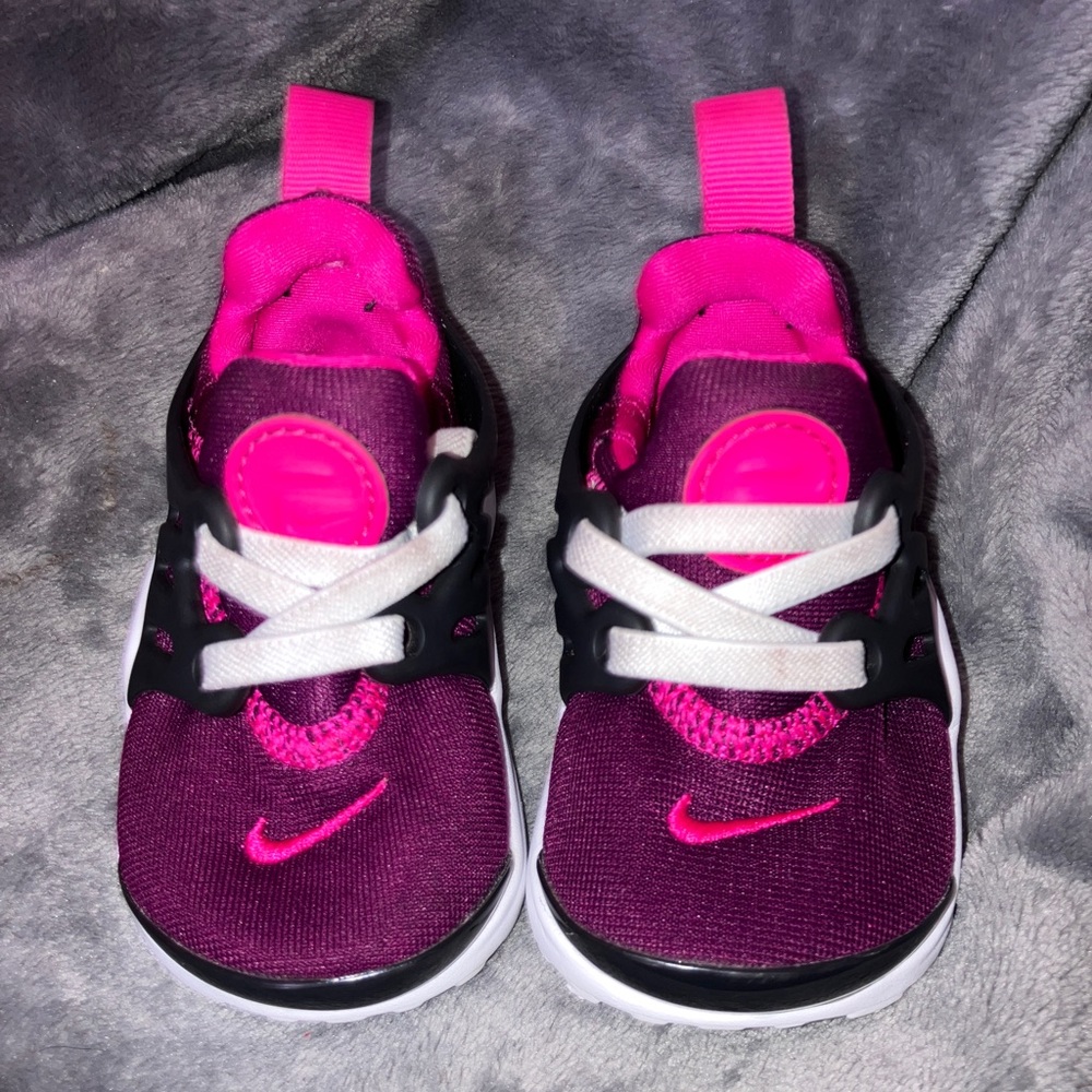 Baby girl Nikes size 4c